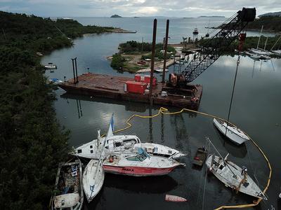 Several boats are reined in